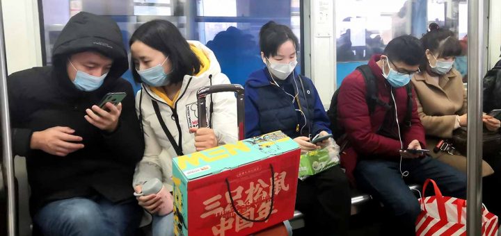 Commuters take precautions against the cornonavirus in the central Chinese city of Chinese of Chongqing on January 23, 2020. Source: Shutterstock